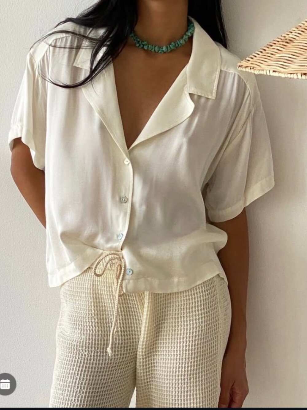 DONNI silky cropped t shirt in cream SizeXSM